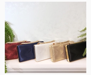 Detailed set of silk texture PU leather evening clutch bags in multiple colors