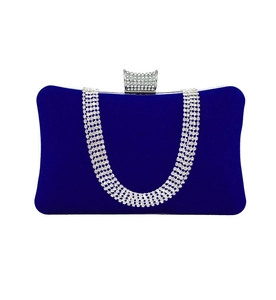 Detail of royal blue velvet evening clutch with sparkling crystal fringe and clasp