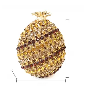 Detail view of crystal pineapple evening clutch bag showing 17x13x8 cm dimensions