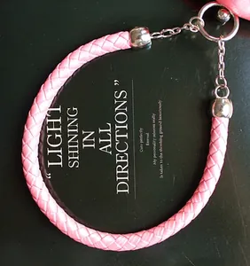 Pink silk bridal handbag with woven leather handle, silver metal chain and floral design