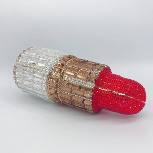 Luxury lipstick shaped evening clutch bag encrusted with sparkling colorful rhinestones