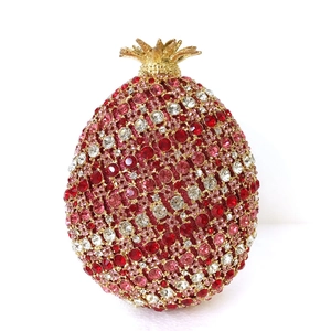 Luxury pomegranate crystal clutch bag with red rhinestones and gold metal leaf details