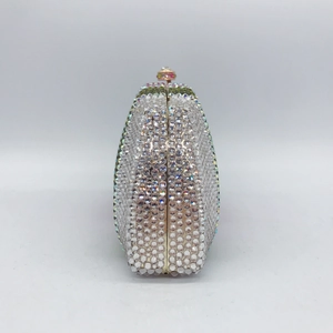 Detail view of the crystal evening clutch side showing intricate hand-set colorful rhinestones