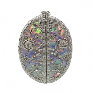 Hollow metal evening clutch bag with sparkling rhinestones and holographic finish