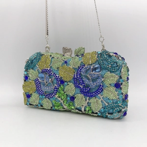 Luxury evening clutch with gradient floral crystals and detachable silver chain strap