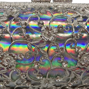 Luxury hollow metal evening clutch bag with floral rhinestones and rainbow holographic lining