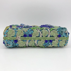 Floral crystal evening clutch bag with green and blue rhinestones on a silver frame