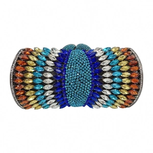 Detail of evening clutch bag featuring colorful marquise-cut rhinestones in a feather pattern