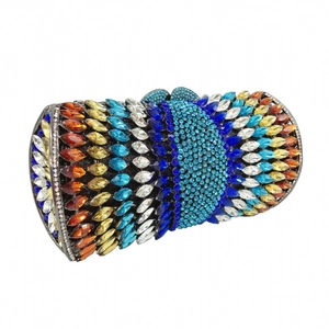 Detailed close-up of a cylindrical clutch with colorful marquise rhinestones and crystals