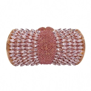 Pink rhinestone evening clutch bag with gold metal frame and sparkling crystal stones