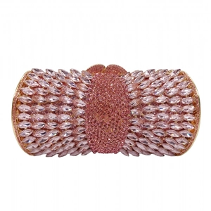 Detailed close-up of pink rhinestones and marquise diamonds on metal evening clutch bag