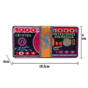 Detail showing 18.5cm length dimensions of the sparkling money stack crystal evening bag