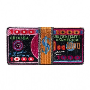 Macro detail of the 1000 dollars crystal clutch bag with vibrant rhinestone lettering