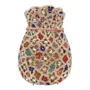Macro detail of luxury evening bag with multi-color rhinestones and hollow metalwork
