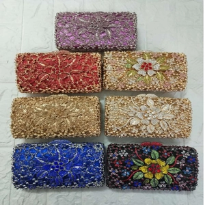 Detailed grid of crystal evening clutch bags in various colors and floral patterns