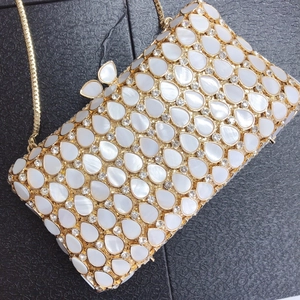 Exquisite teardrop shell evening clutch bag with sparkling crystals and gold metal frame