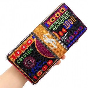 Macro shot of luxury dollar bundle evening bag with colorful hand-set rhinestones