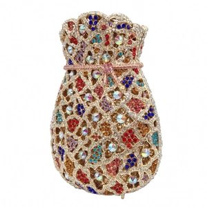 Macro shot of colorful rhinestones on gold frame luxury drawstring evening bag