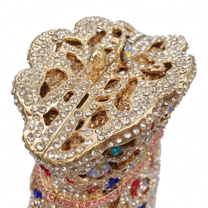 Exquisite gold hollowed evening bag with multi-colored crystals and sparkling white rhinestones