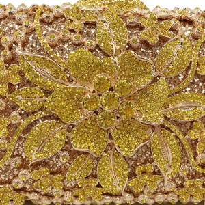 Luxury floral crystal evening clutch bag with intricate gold metal leaf patterns