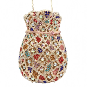 Detailed view of luxury drawstring clutch with colorful rhinestones and gold metalwork