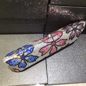 Sparkling crystal hard shell evening clutch with vibrant pink and blue floral pattern