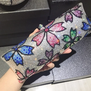 Handheld crystal evening clutch bag with colorful floral rhinestone pattern and metal lock
