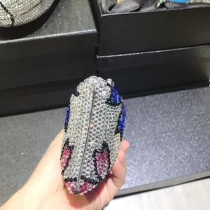 Handcrafted luxury crystal evening clutch bag with colorful rhinestones in a hard case design