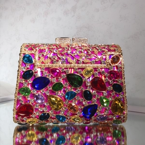Luxury evening clutch with colorful rhinestones and gold floral hollow metal framework