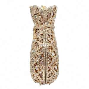 Detailed view of luxury gold镂空 evening bag with crystal encrusting and large gemstones
