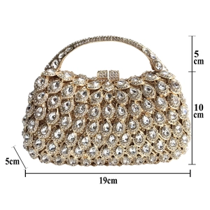Elegant peacock-patterned evening clutch bag with diamonds and golden handle
