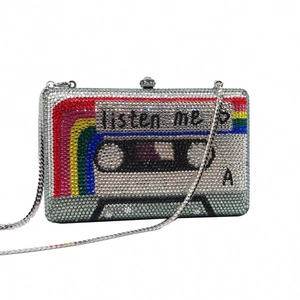 Detail of crystal encrusted vintage cassette evening clutch with rainbow rhinestone patterns