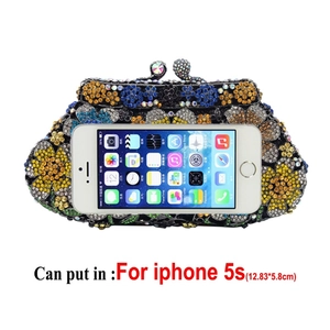 Floral crystal evening clutch showing capacity relative to a compact smartphone