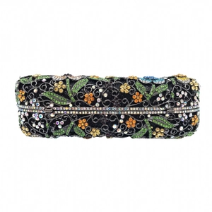 Close-up of luxury floral rhinestone evening clutch with colorful crystals and gold metal wire