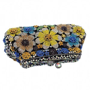 Detailed close-up of colorful crystal floral evening clutch with luxury diamond inlay