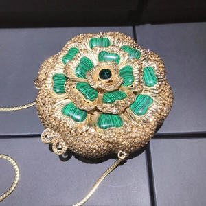 Luxury gold flower evening clutch with marble green petals and sparkling crystals