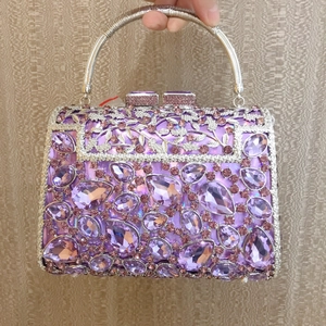 Elegant purple rhinestone evening clutch bag with round metal handle and jewel closure
