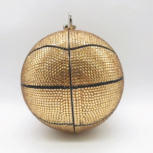 Golden basketball clutch bag with sparkling crystals and metal top handle for evening