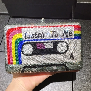 Luxury cassette tape clutch bag with rainbow crystals and Listen To Me lettering