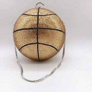 Golden basketball shaped evening clutch bag fully encrusted with shimmering crystals