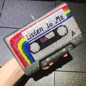 Luxury crystal-encrusted cassette clutch bag with Listen to Me text for evening party
