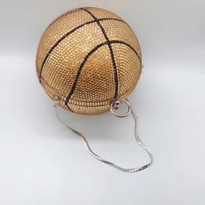 Spherical golden rhinestone basketball clutch bag with ring handle and silver chain strap