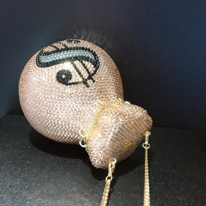Luxury money pouch evening bag with sparkling rose gold rhinestones and dollar sign
