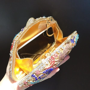 Luxury evening clutch with colorful rhinestones, gold chain, and smartphone capacity