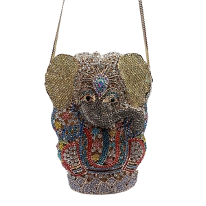Close-up of elephant clutch bag with vibrant multicolored crystal rhinestones and gold chain