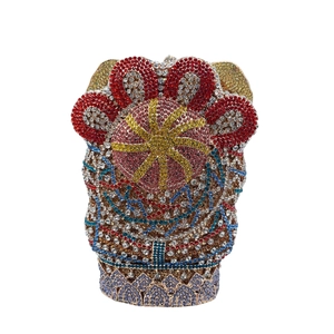 Detailed view of luxury evening clutch with colorful rhinestones in floral patterns