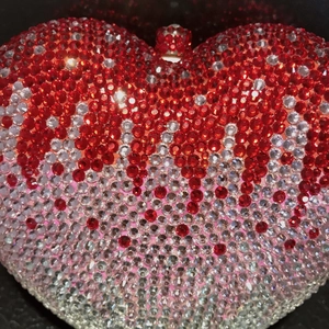 Sparkling heart-shaped evening clutch bag with red and silver rhinestones for parties