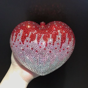 Glittering heart-shaped evening clutch bag with red and pink gradient rhinestone crystal