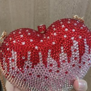 Pink heart-shaped evening clutch bag with gradient rhinestones and gold chain strap