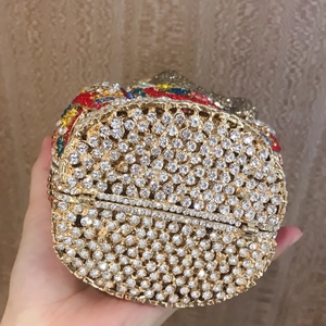 Detailed bottom view of the crystal elephant evening bag with colorful rhinestone pattern